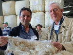 marcelo-grattarola-and-roberto-cardellino-both-from-uruguay-inspect-dohne-wool-at-the-macdonald-co-wool-stores-at-dubbo-by-outcross-media